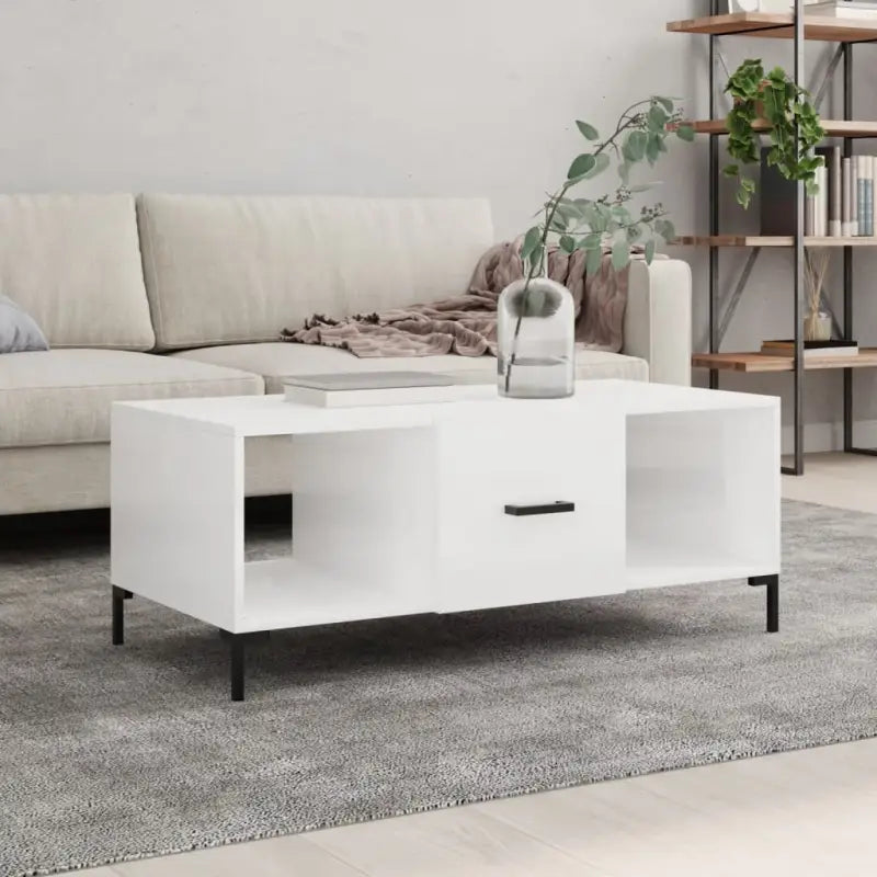 Elegante salontafel met bewerkt hout en ijzeren poten in hoogglans wit