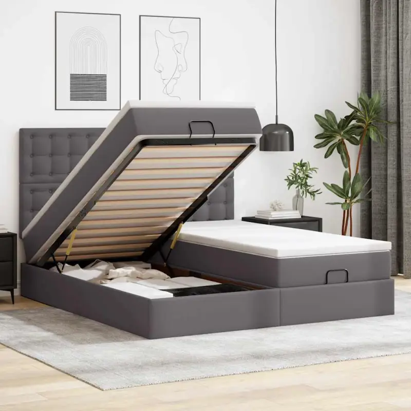 Grijs ottomaan bed met ruime opbergruimte en comfortabel matras