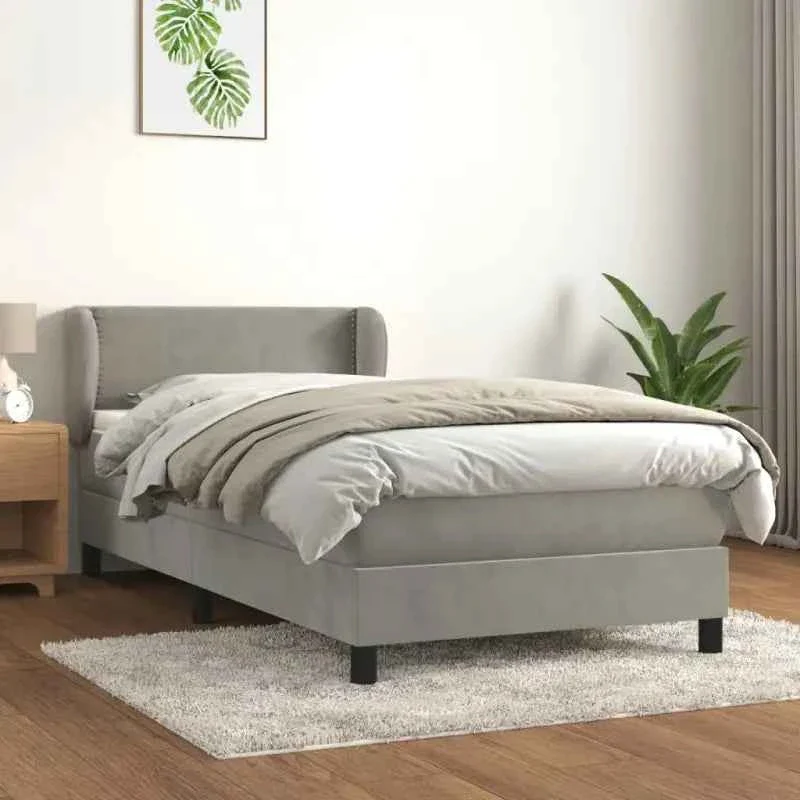 Lichtgrijs materiaal voor boxspringbed met schuim vulling en juiste afmetingen