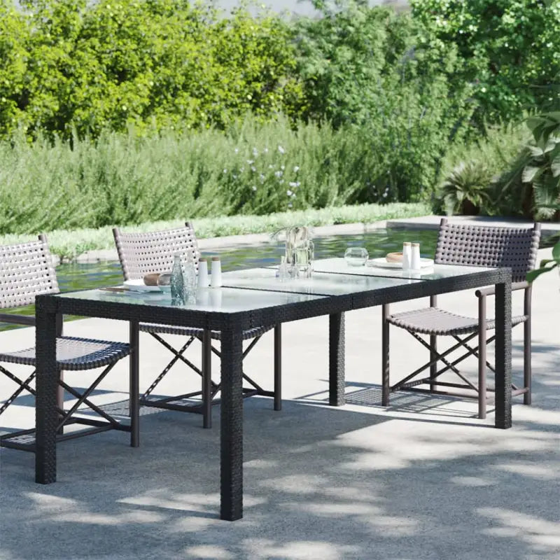 Poly rattan tuintafel met gehard glas voor stijl en stabiliteit